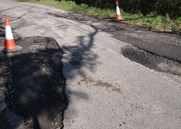 Potholes on Crumlin Road, Ballinderry.