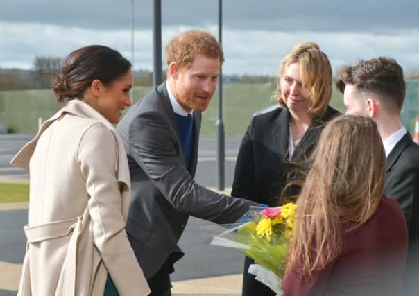 Secretary of State for Northern Ireland Karen Bradley MP and students welcome Prince Harry and Ms. Markle for their first joint visit to Northern Ireland.  Photos by Aaron McCracken.