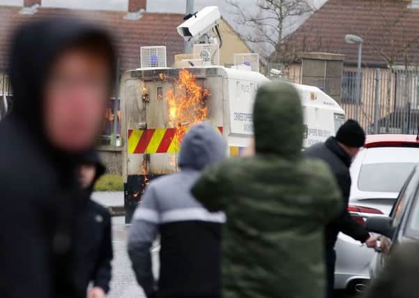 Police have been hit with petrol bombs and projectiles at an illegal dissident republican march in Londonderry.

Photo: Kelvin Boyes / Press Eye