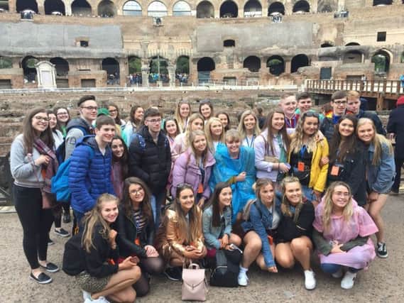 Loreto College students and staff at the Colosseum during their trip to Rome.