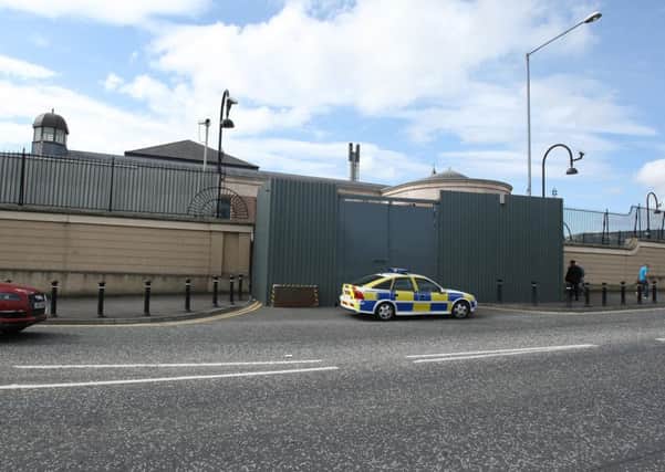 A man has been charged with a car bomb attack on Newry courthouse on 22 February.

The 51-year-old was arrested by detectives from the Serious Crime Branch in the Dunmurry area on Monday.

He is due to appear at Newry Magistrates Court on Wednesday morning.

No-one was killed or injured in the attack but the explosion did cause damage to the gates of the courthouse. It was the first time a large car bomb had exploded in NI for 10 years.