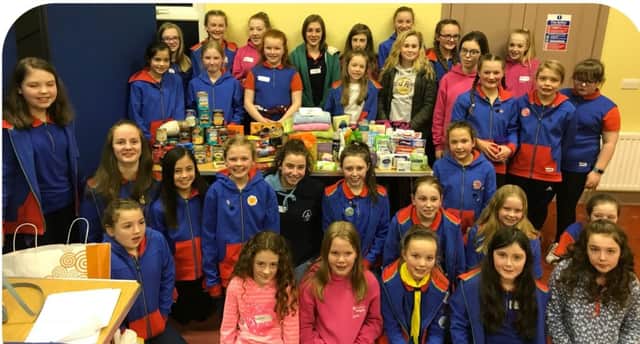 1st Dromore Rainbows and Guides teamed helped to donate over
250 food and toiletry essential packs to Northern Ireland Simon Community.