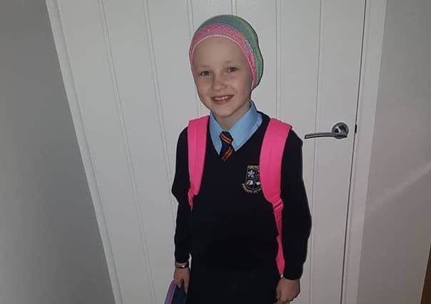 Back to school! Eight-year-old Elsa McBurney returns to Abercorn Primary School following a 15 month cancer fight.