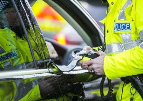 Police were conducting a vehicle checkpoint in Glengormley.