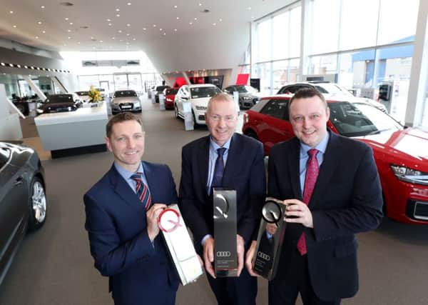 Belfast and Portadown Audi Receive Audi UK Awards: Celebrating success (L-R) Stewart Beattie, Head of Business; Richard Eakin, Managing Director and Richard Armstrong, Customer Services Manager.