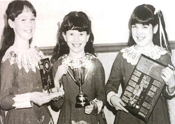 Winners at the Portadown Folk Dancing festival in 1988 are Andrea Mackle, Katuhleen Grimley and Ciara Nichols.
