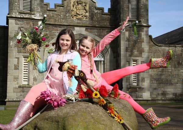 Helping launch this years Allianz Garden Show Ireland which is to be held at Antrim Castle Gardens are local primary pupils Katie and Jessica.