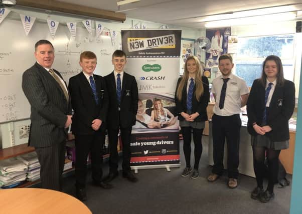 Specsavers Banbridge lab manager Colm Martin (2nd right) joined Banbridge High School students (from left) Jordan Dunlop, Jack Webb, Holly McColl and Grace Kelly at a New Driver NI presentation held recently at the college.