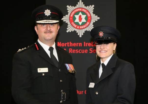Firefighter Jess Doran pictured with Chief Fire & Rescue Officer Gary Thompson at her recent graduation.