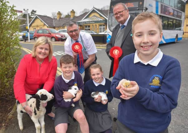 Ballymacash PS pupils Matthew, Ellie and James joined Rhonda Geary from RUAS, Philip James from Translink Ulsterbus, Pat Hunt from Translink NI Railways and some farmyard friends to announce Translink's special bus, coach and train transport plans for this year's Balmoral Show, May 16 - 19.