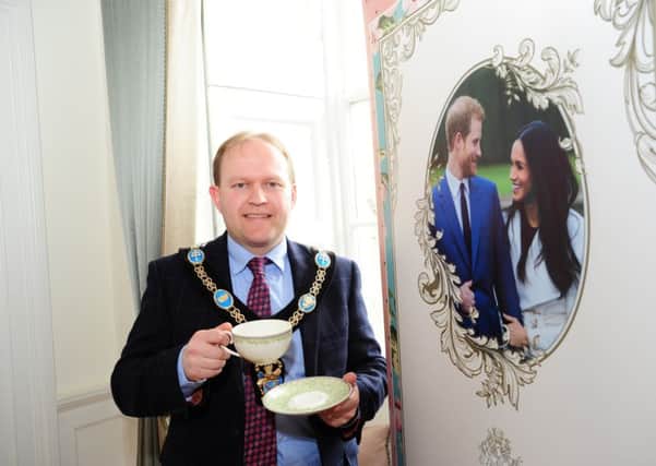 Lord Mayor Gareth Wilson in the Royal Photo Booth awaiting guests for a special tea party to mark the wedding of Prince Harry and Meghan Markle  Photo by Liam McArdle