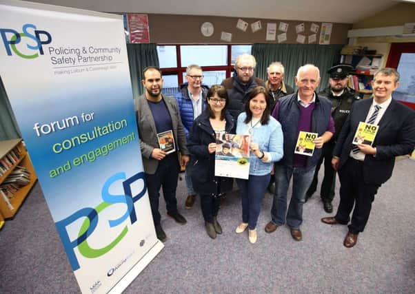 Cllr Luke Poots, independent PCSP member Yvonne Craig and Edwin Poots MLA with local Neighbourhood Watch Co-ordinators and Constable Chris Hinds.