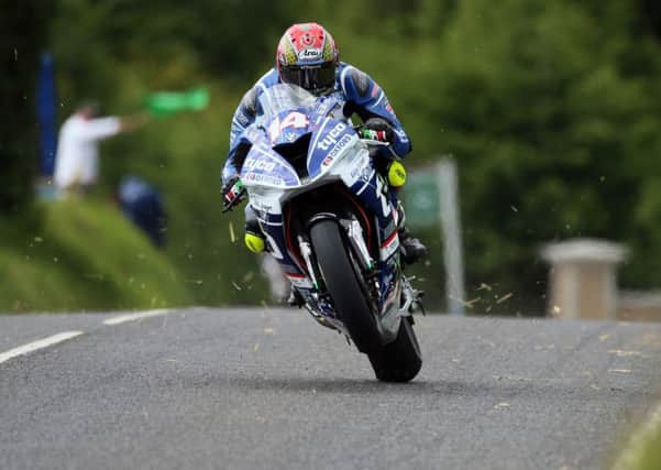 Tyco BMW's Dan Kneen is set to return to the Tandragee 100.