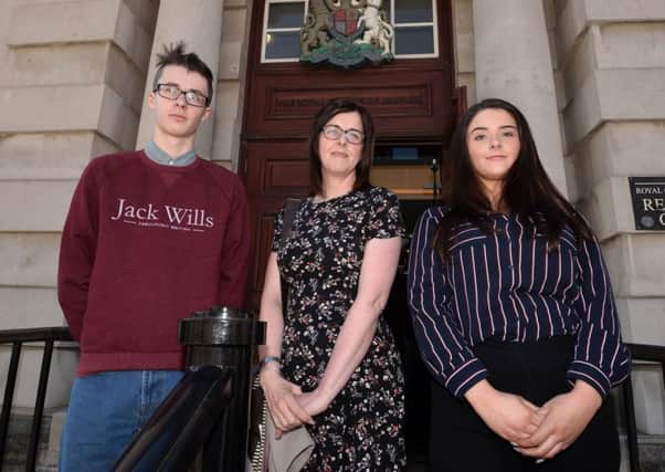Siobhan McLaughlin with her children Billy and Rebecca at the Supreme Court sitting at Belfast High Court