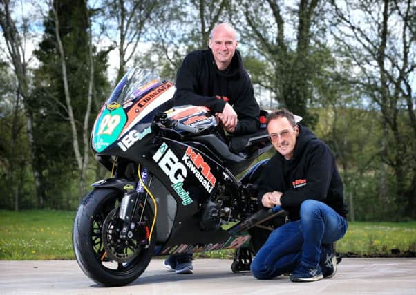 Jeremy McWilliams with Ryan Farquhar and the KMR Kawasaki ER6 he will race in the Supertwins races at the Vauxhall International North West 200.