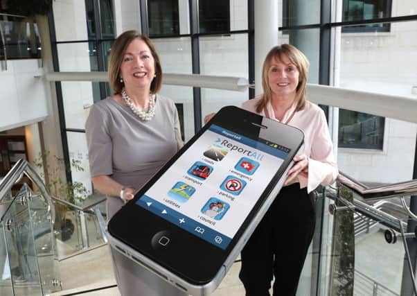 Chief Executive of the Council, Dr Theresa Donaldson and  Chairman of the Councils Governance and Audit Committee, Councillor Amanda Grehan are encouraging residents to download the Report All app.