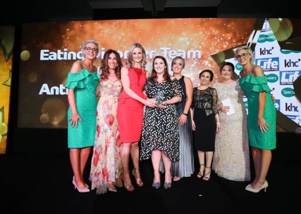 Winners of the Spirit of Health award, the Eating Disorder Team from CAMHS at Antrim Area Hospital collect their award from Aideen Duggan, from category sponsor Keenan Healthcare and Gaynor Faye. Also pictured are ambassadors from title sponsor Specsavers, Nicola and Alison Crimmins. The Eating Disorder Team was one of ten winners at the Sunday Life Spirit of Northern Ireland Awards with Specsavers. 
Photo by Kelvin Boyes / Press Eye