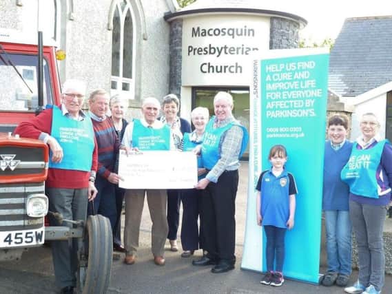 Freddie and Janette Tannahill with supporters after the fundraising Tractor Run for Parkinson's UK.