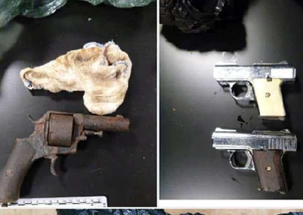 Weapons found in Lurgan during a series of police swoops