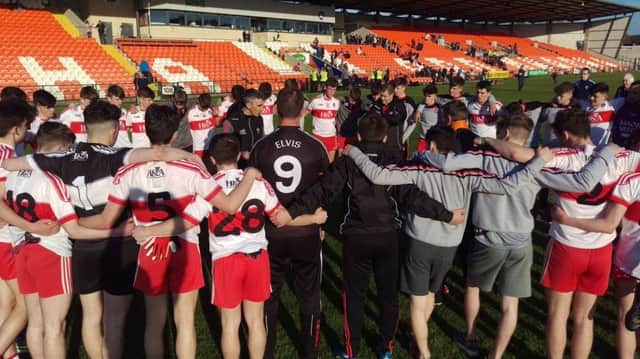 Derry minor manager Paddy Campbell addresses his players after the impressive victory over Armagh at the weekend.