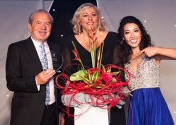 Corrina pictured with Lord Sugar and Susan Ma.