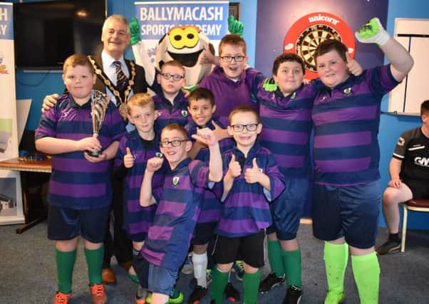 Winners of the inaugural Bluebell Cup held at Ballymacash Sports Academy were Cedar Lodge. They are pictured with Mayor Tim Morrow. The team will defend the trophy at the Bluebell Ground in Lisburn on May 16.