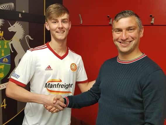 Liam McKenna with Portadown manager Matthew Tipton following confirmation of his signing at Shamrock Park.