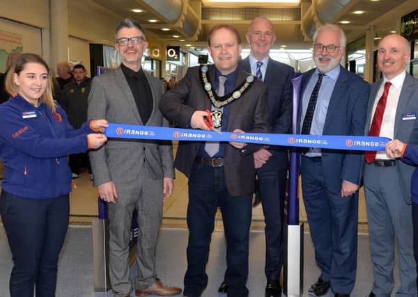 Mayor of ABC Council, Alderman Gareth Wilson cuts the ribbon to officially open the new Range store at the Meadows Shopping Centre. Also included are from left, Leah Johnston, James Rider, general manager, Nigel Oddy, Range CEO, Ken Fox, regional manager, and Samantha Millar. INPT20-200.