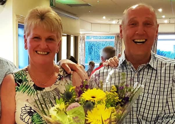 Catering duo Angeline and Andy McWilliams at their retirement party in Carrickfegus Golf Club after almost 20 years of service.