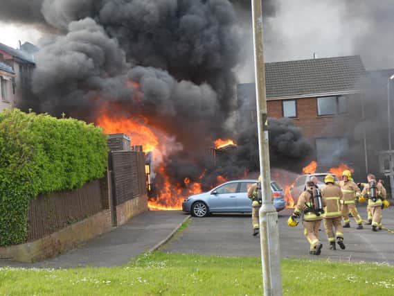 Firefighters arrive at the scene of the huge blaze in Ballyduff. Pics by Jamie Steenson