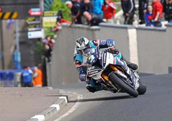 Michael Dunlop on the Tyco BMW in the feature North West 200 Superbike race.