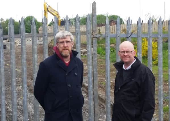 Sinn Fein MLA John O'Dowd with party colleague Cllr Paul Duffy