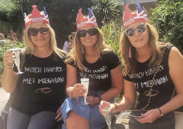 Doreen Hamilton, Andrea Donaldson and Esther Liggett from Portadown enjoying the royal wedding in Windsor at the weekend