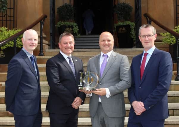 Ashley McCulla of Lisburn-based firm McCulla Ireland was named Family Business Director of the Year at the annual Institute of Directors Northern Ireland (IoD NI) Director of the Year Awards sponsored by First Trust Bank. He is pictured with Brian Gillan, Head of Business and Corporate Banking, First Trust Bank, IoD NI Chairman Gordon Milligan and Adrian Moynihan, Head of First Trust Bank in Northern Ireland. Pic by Darren Kidd, Press Eye