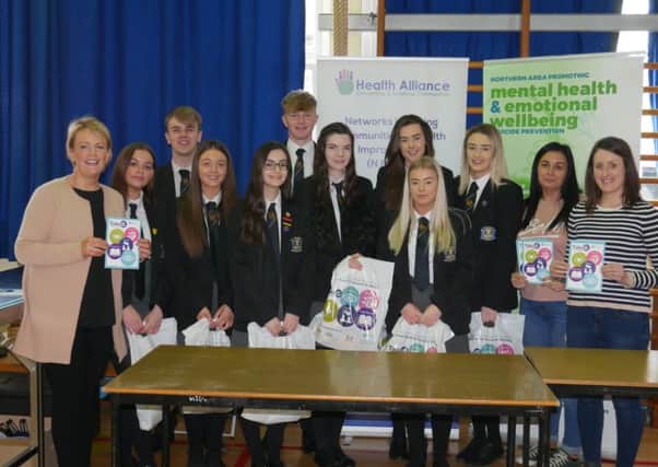 Mrs McIlwrath with her senior school helpers and some charity representatives at the Carrick College Health Event.