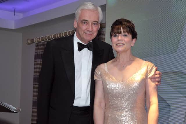 Compere at the Larne Business Awards, Paul Clark, with Carlee Letson. INLT 19-231-AM