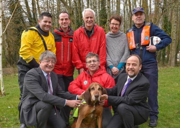 (L-R) Back Row:  Sean Rocks (Lough Neagh Search and Rescue), Jonathan Shields (North West Mountain Rescue Team), Dave Goddard (Mourne Mountain Rescue Team), Debbie Corry (DoJ Search and Rescue Coordinator), Paul Stitt (Community Rescue Service). Front Row: Nick Perry (DoJ Permanent Secretary), Raymond Shannon (Search and Rescue Dog Association Ireland North), and Anthony Harbinson (DoJ Director Safer Communities).  Photo by Aaron McCracken