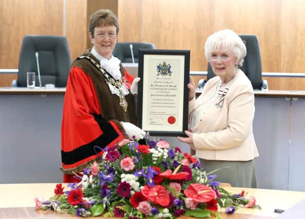 Mrs Joan Christie CVO OBE is congratulated by the Mayor of Causeway Coast and Glens Borough  Council Councillor Joan Baird OBE after becoming a Freeman of the Borough in recognition of her  role as Her Majesty's Lord Lieutenant for County Antrim. Pic Steven  McAuley/McAuley Multimedia