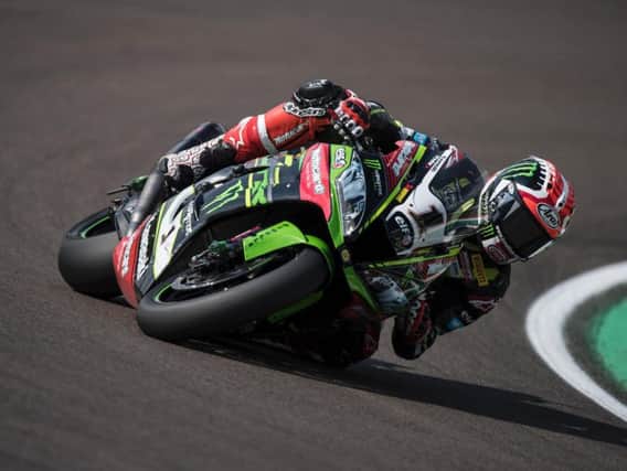 Jonathan Rea equalled Carl Fogarty's record of 59 World Superbike victories with a double at Imola in Italy.