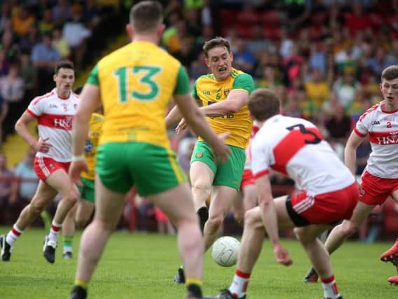 Donegal's Hugh McFadden scores his side's crucial first half goal against Derry.