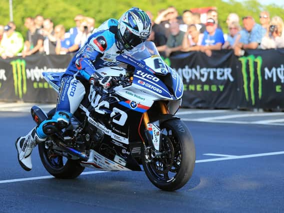 Michael Dunlop leaves the line on the Tyco BMW on Monday evening.
