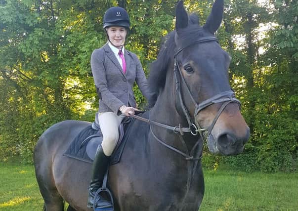 Leah pictured with her horse Chester, in practice for Saturdays show