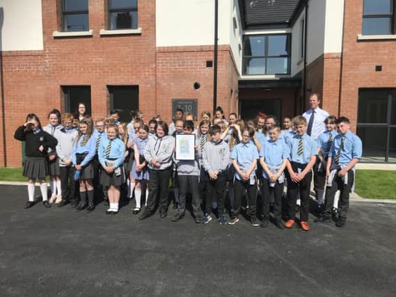 Some of the pupils who were involved in the naming process at the new development.