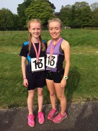 Cookstown High School's Lucy McClenaghan who won a silver medal in the mini girls' long jump with a jump of 4.36 metres at the Ulster Schools Athletics Championships and Grace Carson who won gold in senior girls 3000  metres and silver in the senior girls 1500 metres.