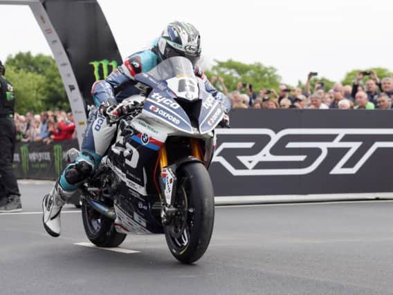 Michael Dunlop leaves the line on the Tyco BMW in the RST Superbike race.