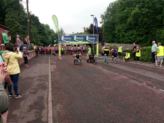 The wheelchair athletes get the sixth SSE Airtricity Walled City Marathon underway at the Everglades Hotel