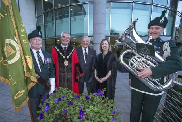 Pictured at the Beating Retreat in Lisburn, paying tribute to the Royal Irish Rangers are The Mayor of Lisburn & Castlereagh City Council, Councillor Tim Morrow, General Sir Roger Wheeler, President of the Rangers Association and Dr Theresa Donaldson, Chief Executive of the council, with a veteran of the regiment and RIR band member.