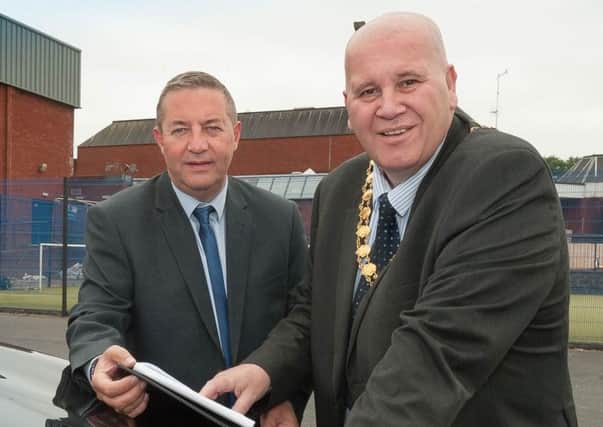 Outgoing Mayor Paul Reid with Councils car parking manager Andrew Oliver