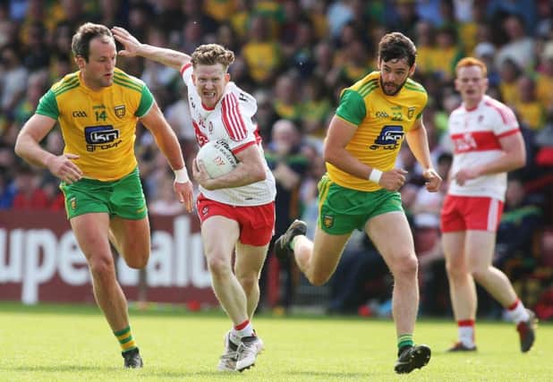 Enda Lynn takes on  Donegal duo Michael Murphy and Odhran McNiallais during the Ulster Championship defeat two weeks ago. (Â©INPHO/Lorcan Doherty)