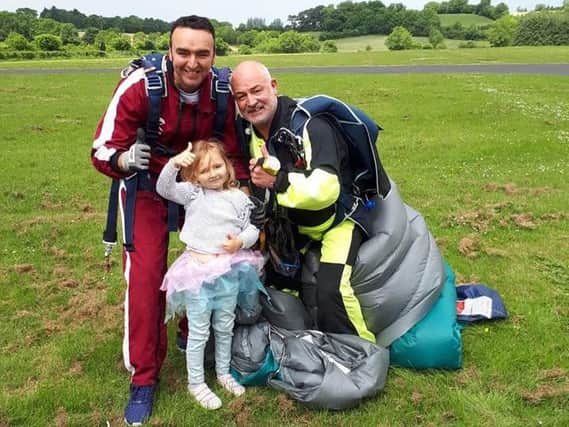 Peter Gardner, his daughter Ava and Wild Geese instructor Andrew Davis.